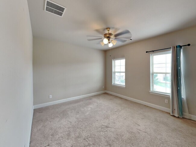 Building Photo - Breathtaking 4-bedroom home in the highly ...