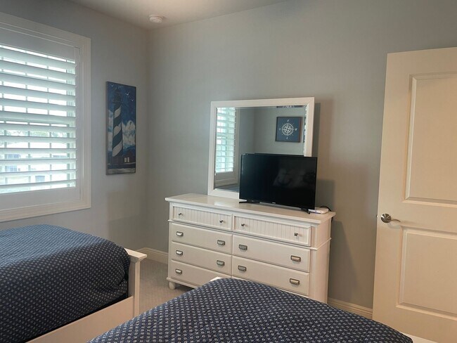 Building Photo - Coastal Luxury at Hidden Bay | 3BR Waterfront Condo with Bay Views