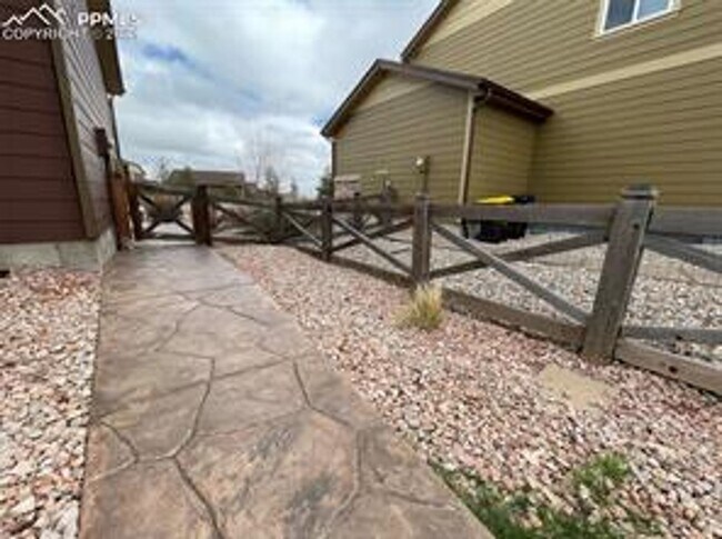 Building Photo - Stunning 4/3/3 Home in Banning Lewis Ranch!!!