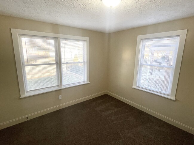 Building Photo - 3 Bedroom Home  with huge, 2-car garage/workshop combo (has electricity)