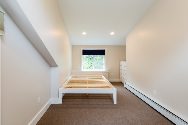 3 of 3. Vaulted Ceilings In Both Upper Beds - 629 Storrs Rd