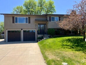 Building Photo - Great corner lot home backing up to open s...