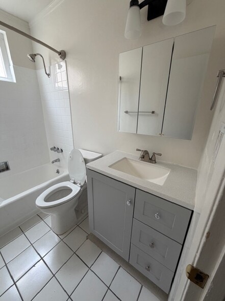 New vanity,faucet.medicine cabinet, new refinished tile and tub - 1123 S Wooster St