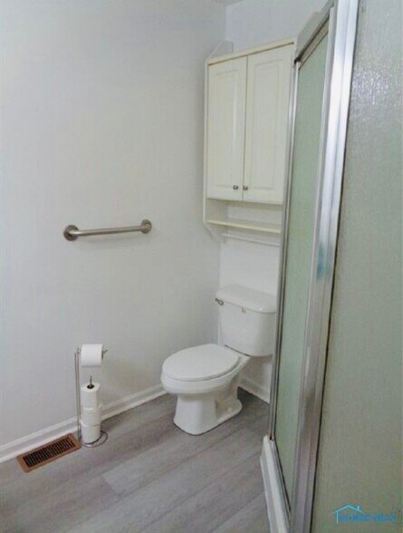 Full bathroom toilet and shower. - 319 Garfield Ave