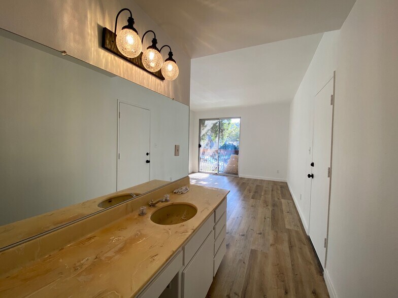 Bathroom side of the master bath - 104 S Hayworth Ave