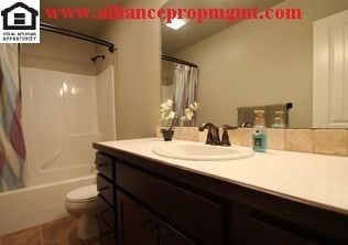 Building Photo - Centrally-located 3 bedroom home with paved RV parking.