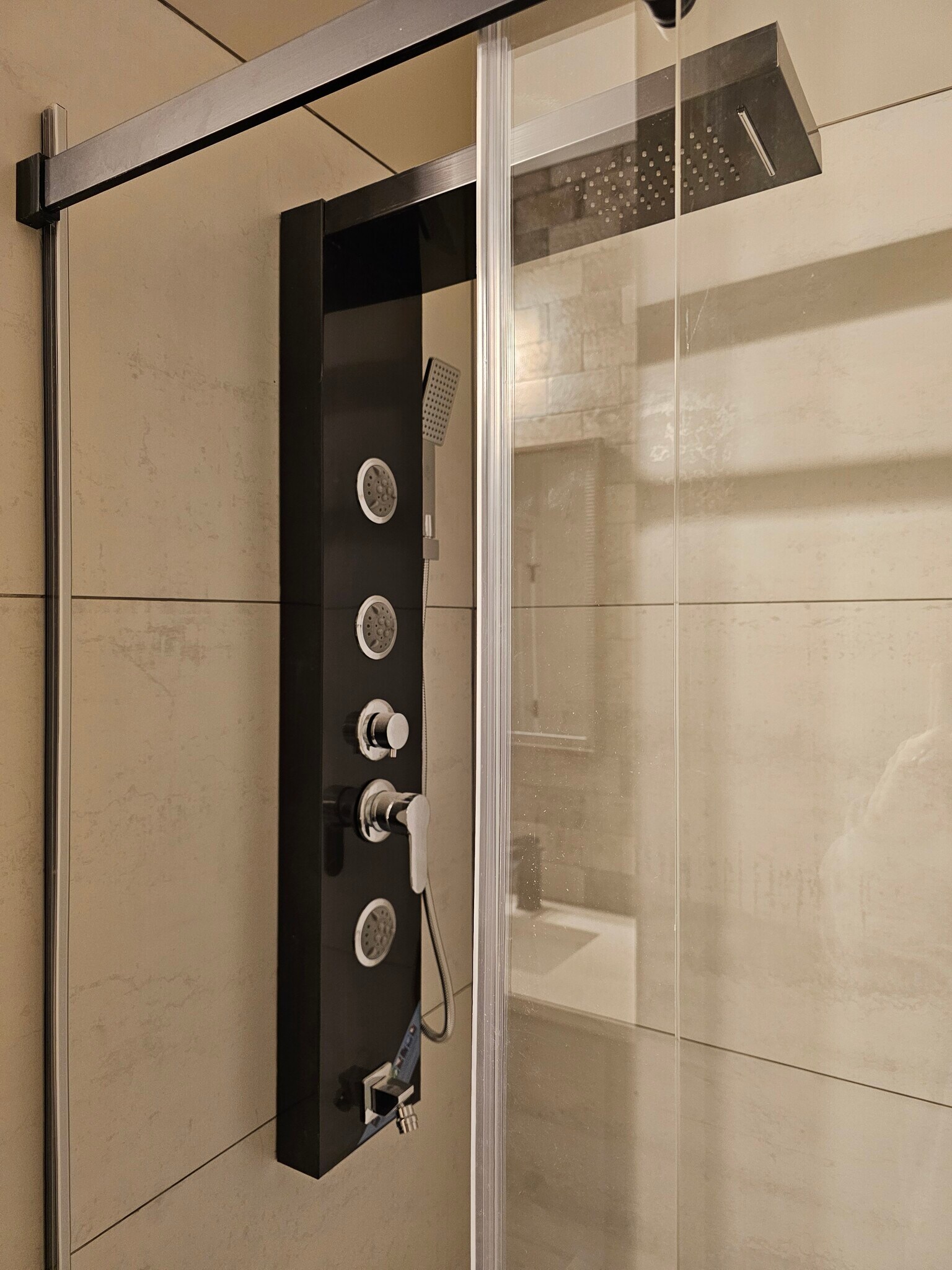 Massage jet shower panel - 5827 Broadway St