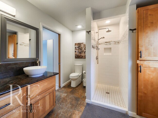 Building Photo - Modern Elegance Meets Tranquil Lakeside Living On Osprey Circle