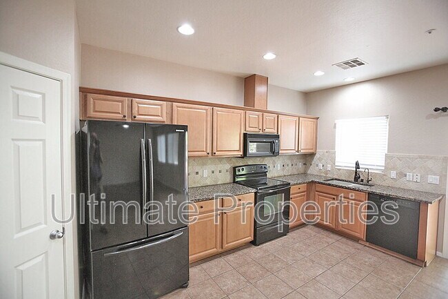 Building Photo - 8856 W Aster Dr