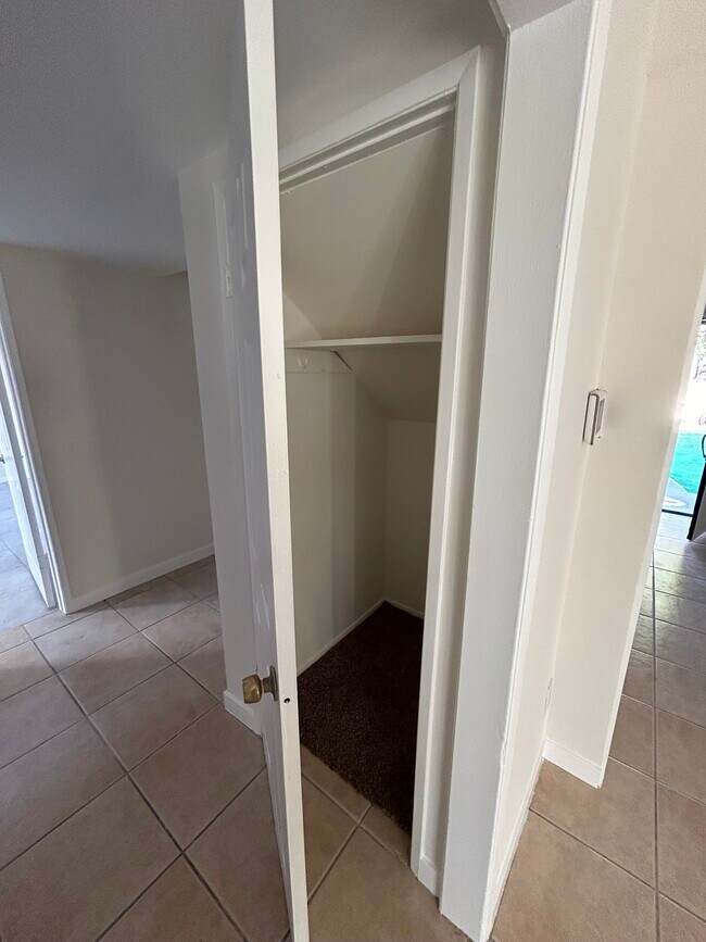 Downstairs hallway closet - 11690 Kismet Ave