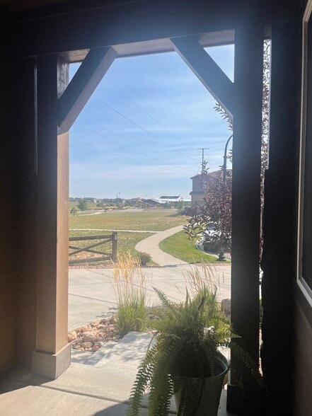 View of the family water park from front porch - 8782 Windy Plains Ct