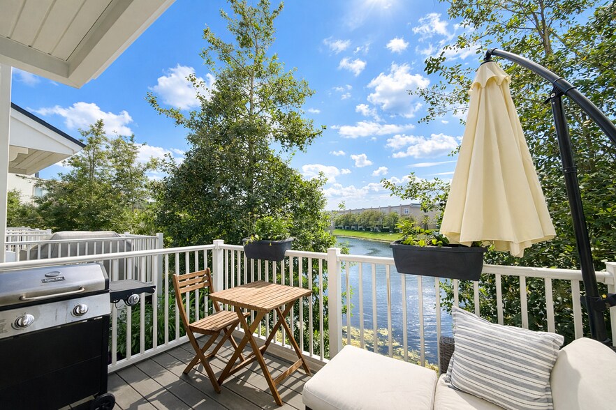 Outdoor patio area with water fountain views - 4428 Ellipse Dr