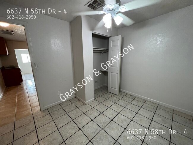 Building Photo - 6637 N 58th Dr