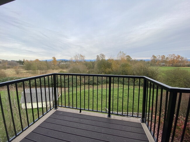 Building Photo - Spacious 4-bedroom with Panoramic Deck Nex...