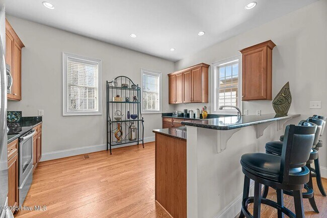 Building Photo - Resort-Style Living | Furnished Townhome with Veranda & Views | Tennis & Golf