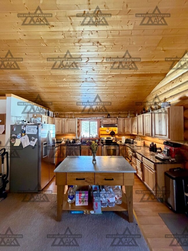 Building Photo - Charming Cabin – 2BR Home with Wood Stove - Dog Friendly