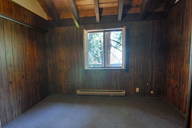 Building Photo - LONG-TERM RENTAL: Upper Floor Unit in Duplex with Washer/Dryer & Wood Stove!