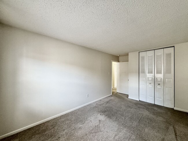 Building Photo - READY NOW!! Fenced Patio - Pet Friendly - Over 1,500 Square Feet!!