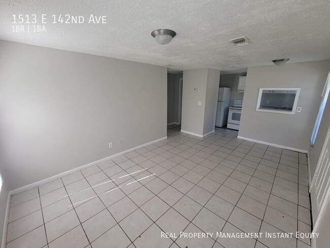 Building Photo - 1513 E 142nd Ave