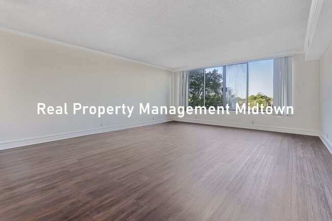 Building Photo - Charming Condo in Established Community of...