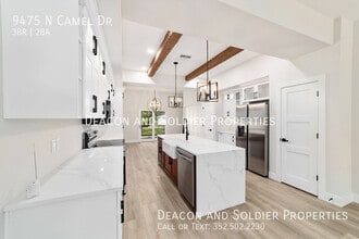 Building Photo - 9475 N Camel Dr