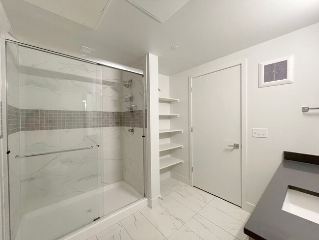 Building Photo - Improved Price!!!! Bustling Location! Mode...
