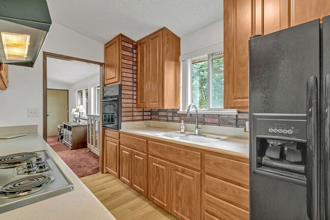 Building Photo - Looking for a Dream Garage attached to a Rambler?