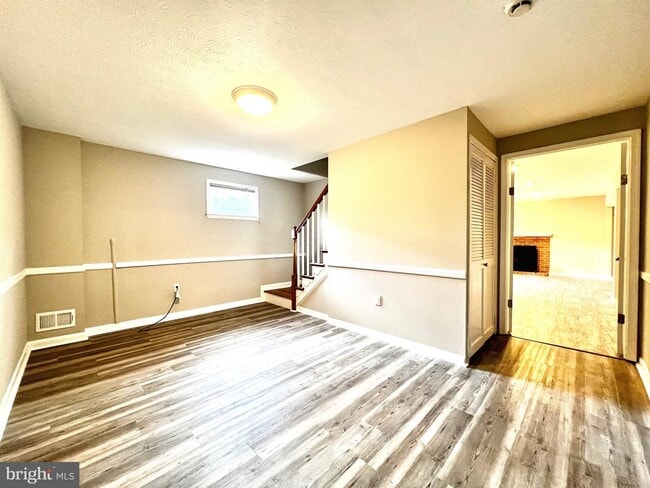 Building Photo - 5719 Rossmore Dr