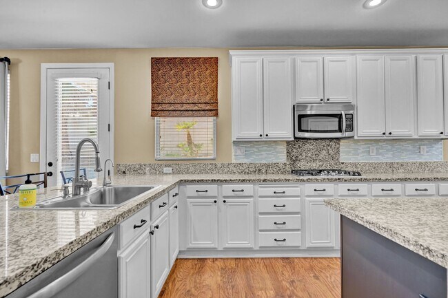 Building Photo - A Fabulous 4 Bedroom Home with a Sparkling Pool!!!