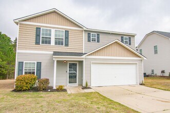 Building Photo - 4 Bedroom 3 Bathroom Home- Pets Okay!