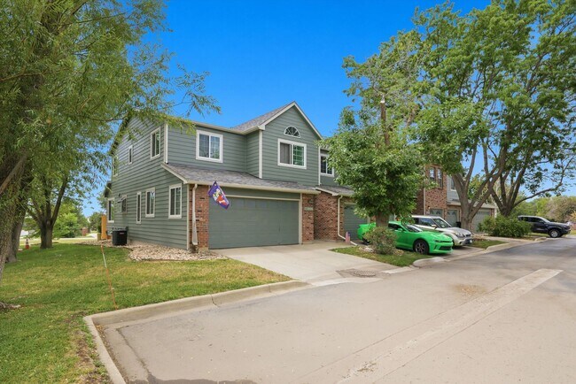 Building Photo - Spacious 4-Bedroom Townhome Backing to Open Space – Attached 2-Car Garage!