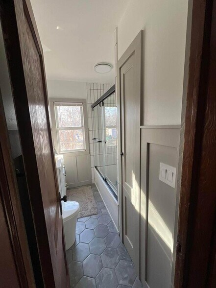 Updated Bathroom of UNIT 1- Unit 2 bathroom to be remodeled in similar style - 2209 E 33rd St