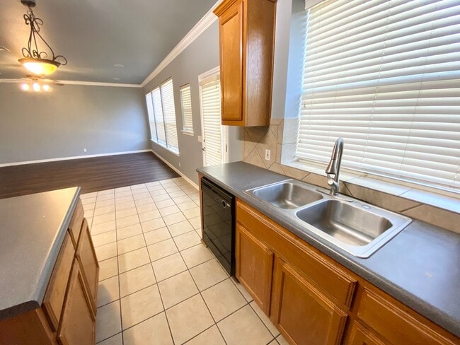 Building Photo - 4 bedrooms, a game room, and a large dedicated office!