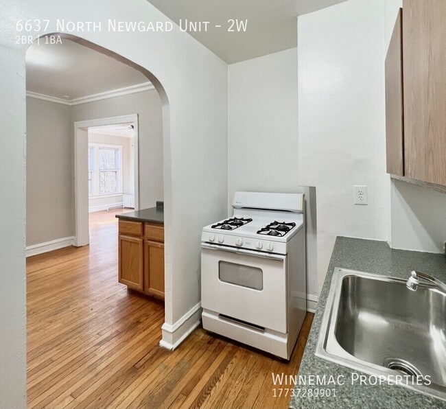 Building Photo - 6637 N Newgard Ave