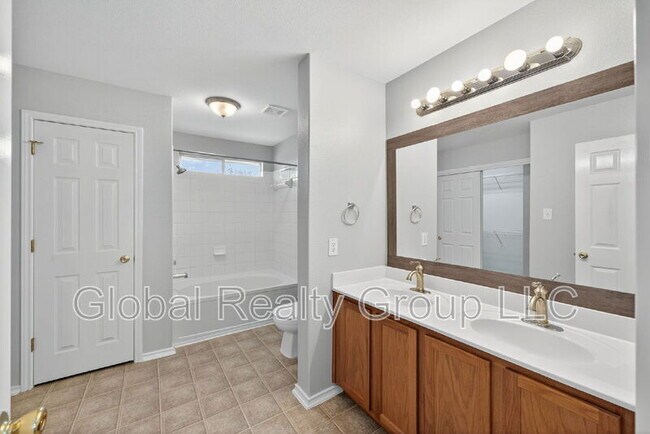 Building Photo - 10411 Artesia Wells
