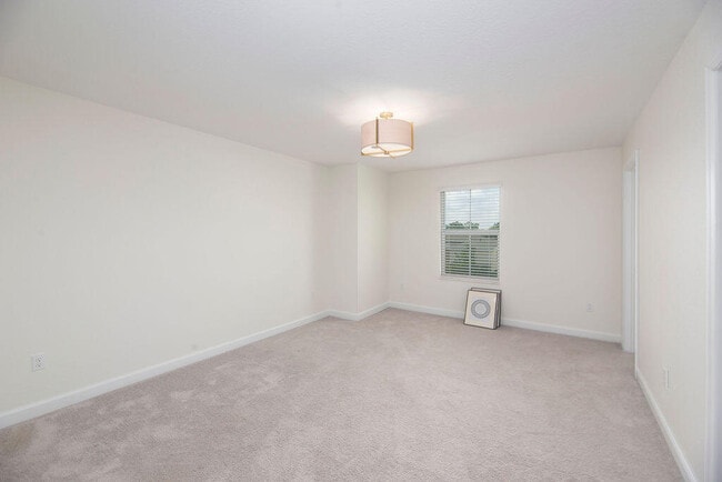Building Photo - 7499 NW Deysbrook Ln