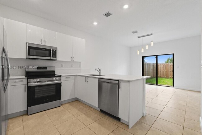 Building Photo - 23016 SW 129th Ct