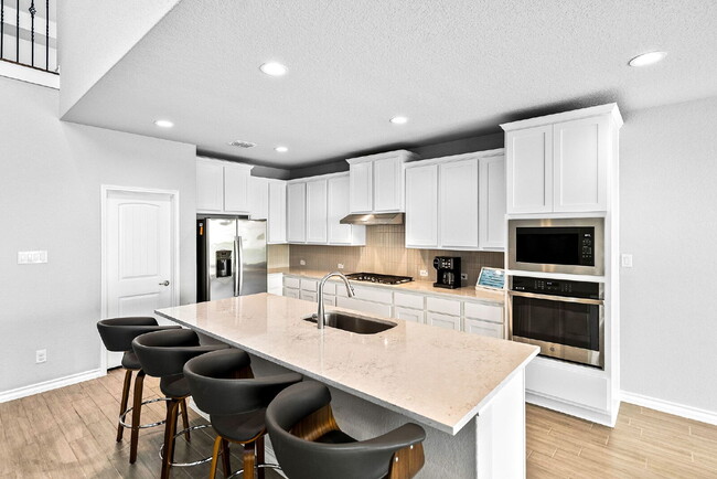 Building Photo - Rare Cibolo Canyons Opportunity | Guest Suite Downstairs, Optional 5th Bedroom, No Carpet, No Rea...