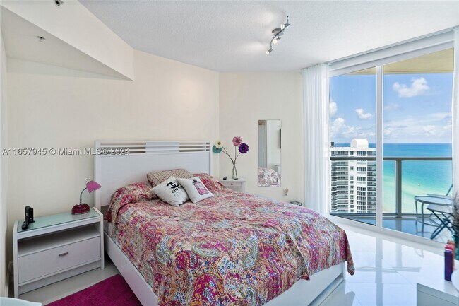 Building Photo - 16699 Collins Ave