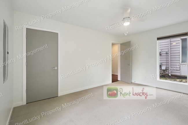 Building Photo - Immaculate and LARGE 4-Bedroom Home in Unb...