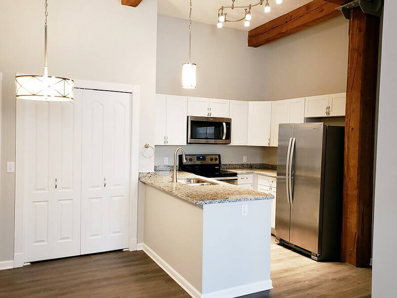 Enjoy High Beamed Ceilings at Riverwalk - Grand Ledge Apartments