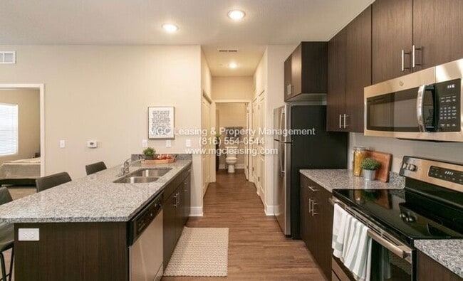 Building Photo - Hot Deal Alert! Move In May and Save!
