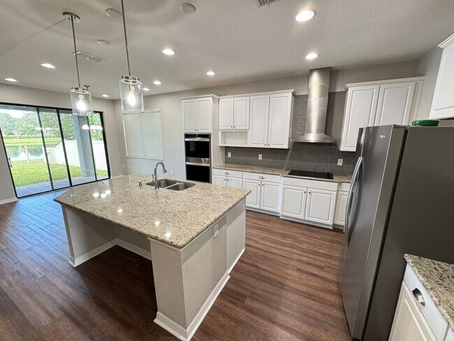 Building Photo - $300 off of a month of rent!! Experience the Epitome of Lakeside Luxury Living — For Rent in Narc...