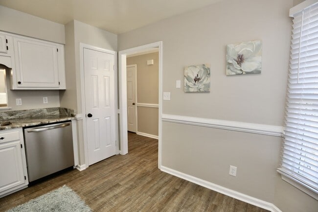 Building Photo - Updated End-Unit Brick Townhome Ready NOW!...