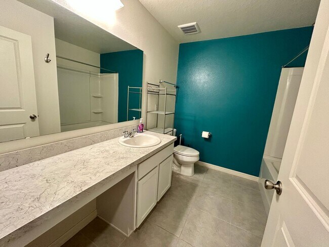 Building Photo - Spacious 3-Bed, 2-Bath Fully Gated Home in...