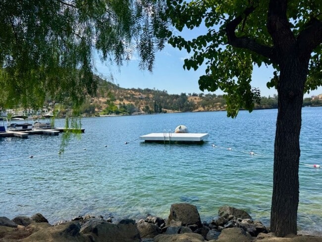 Building Photo - Move in special: $500 off first months rent! Home located in a gated Lakefront community with 3 s...