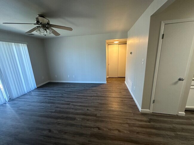 Large family room with fan and sliding door to patio - 4300 Arrow Tree Dr