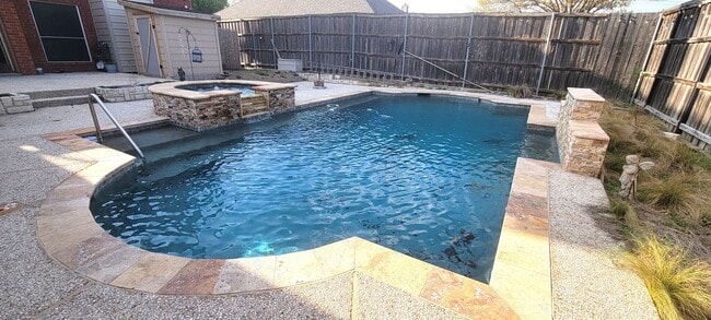 Building Photo - Spacious 4-Bedroom Home with Pool & Spa in...