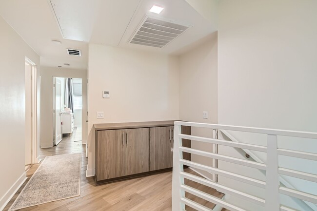 Building Photo - Live Elevated in Civita – Stunning Multi-L...