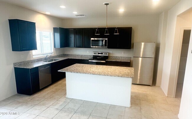 Building Photo - 24588 W Flores Dr